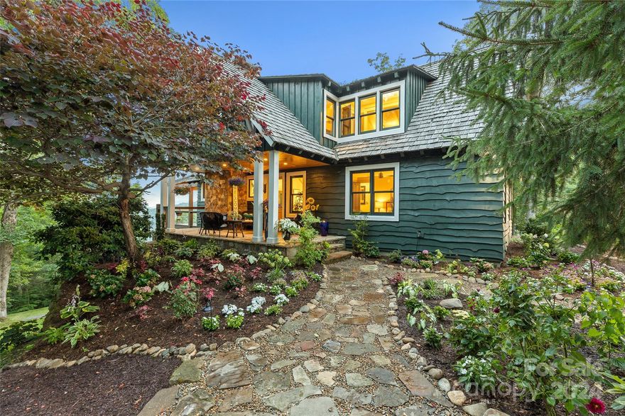 Discover this stunning home with magnificent views and exceptional features. Recent updates include new cable railings, a covered outdoor living space, refreshed cabinets, refinished floors, and fresh paint in designer colors. Dual master bedrooms on the main and upper levels add luxury and convenience. Enjoy year-round views and cool summer evenings from the elevated covered deck.

Located just 15 minutes from Cashiers and close to Lake Glenville, Highlands, and Asheville, this home offers easy access to outdoor activities, shopping, and dining. The vibrant local culture, with live music, craft shows, and farmers' markets, enhances the appeal. Known as "Summer Camp for Adults," the Plateau lifestyle promises enjoyment and relaxation. Don't miss the chance to experience this remarkable home.