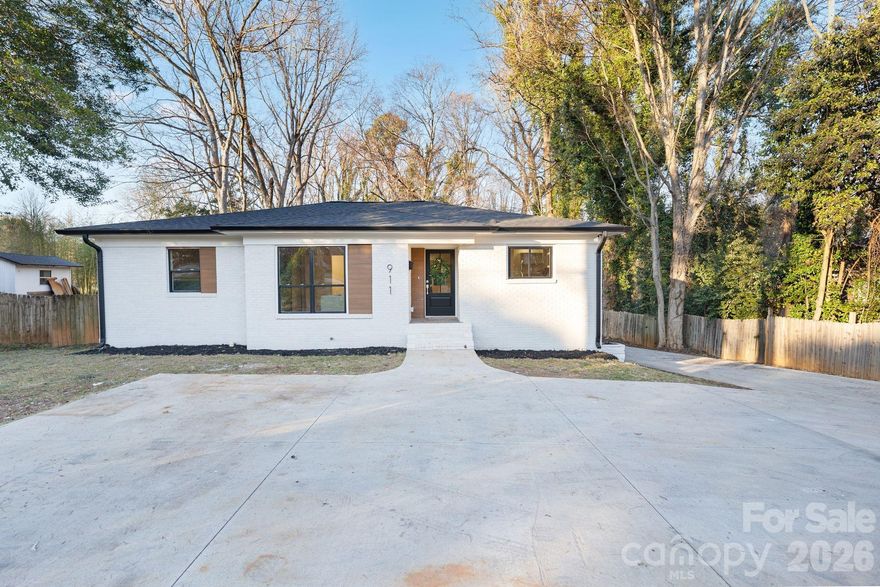 This home is a statement in design, scale, and location. Professionally curated from top to bottom, this home showcases elevated finishes and architectural detail throughout, with striking archways that define the main level and create a dramatic yet seamless flow—an entertainer’s dream in every sense. 

The main floor is designed for both grand hosting and everyday living. The open concept flows seamlessly from the kitchen to the main living area with abundant natural light. The kitchen features stunning quartz countertops, a waterfall island, custom cabinetry, and brand-new stainless steel appliances. If you were not already blown away by the renovated kitchen and gorgeous arches, then the primary bedroom will take you over the top! The dream-worthy primary suite offers a true retreat featuring a one-of-a-kind walk-in closet and an en-suite bath that feels straight out of a design magazine. It features a custom arched glass door, soaking tub, and elegant tile. 

With 4 bedrooms and 3 full baths, the home provides exceptional flexibility, including a dedicated guest suite and a secondary living space on the lower level—ideal for extended stays, work-from-home living, and private relaxation. The future homeowner will have peace of mind with a new roof (2025), new HVAC systems (2025), new water heater (2025), new windows (2025), fresh exterior and interior paint, updated plumbing and electric. 

A large driveway leads to a rare two-car garage, a true luxury in this area. Just steps from Park Road Shopping Center and surrounded by new luxury development, this location offers walkability, convenience, and long-term desirability. A savvy homebuyer has the perfect opportunity to have an income-producing rental of the lower level with a separate entrance/exit.

This is not just a home—it’s a refined lifestyle opportunity in one of Charlotte’s most coveted locations.