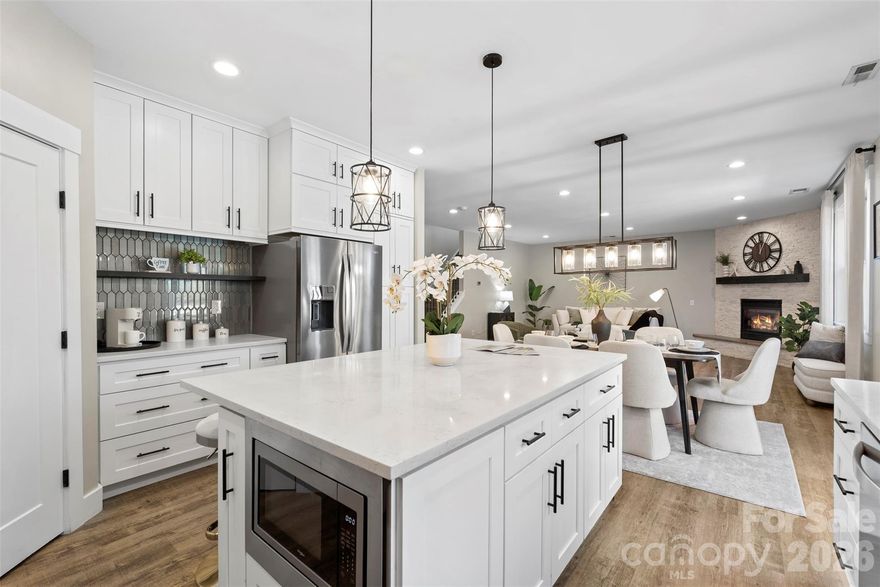 Welcome to this beautifully renovated home located in the highly sought-after Wesley Oaks neighborhood, known for its top-rated school district and vibrant community atmosphere. As soon as you walk in, you’re greeted by a flexible front room that can serve as a formal dining space, home office, or movie/bonus room. The main level features an open floor plan, updated LVP flooring, and a fully updated kitchen with upgraded appliances and modern finishes. Upstairs includes a spacious loft and four additional bedrooms, including a large primary suite with enough room for a sitting area. The primary bathroom feels like a retreat with a glass walk-in shower, a standalone soaking tub, and built-in shelving inside the walk-in closet. Step outside to a large fenced backyard with a pergola and an expansive paved patio that is perfect for entertaining or relaxing. The roof was replaced in (2019) and a 2022 water heater for added peace of mind. Wesley Oaks offers fantastic neighborhood amenities, including a community pool, clubhouse, playground, walking trail, sidewalks, and neighborhood events throughout the year. The home is just minutes from the Wesley Chapel shopping plaza with grocery stores, restaurants, and everyday conveniences, as well as a short drive to charming Downtown Waxhaw. 
This home delivers modern updates, flexible spaces, and an unbeatable location within one of the area’s most desirable communities.