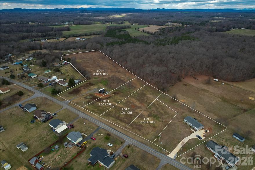 1.14 acre parcel on Speaks Rd in Olin, NC. Private country setting with endless possibilities: perfect for a private getaway, new development for a contractor, small cabin, recreational camping, or RV site. Includes 2025 RV and workshop with heating, cooling, and electricity. Restrictions: minimum 1,000 sq ft home applies only to the 0.60 acre lot line facing Speaks Rd; beyond that, no restrictions. Additional nearby lots and acreage also available.