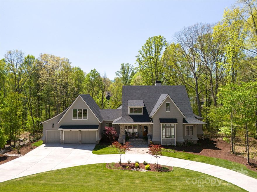 ABSOLUTELY STUNNING ONE OF A KIND CUSTOM HOME IN DESIRABLE BILTMORE LAKE! THIS STYLISH ONE LEVEL PLUS BASEMENT WAS METICULOUSLY DESIGNED AND SUPERBLY BUILT ON A GENTLE LOT IN GATED AND UPSCALE WATERS EDGE. YOU WILL FALL IN LOVE WITH THE ATTENTION TO DETAIL, THE OVERSIZED KITCHEN, NATURAL LIGHT FILLED ROOMS, LARGE PRIMARY BEDROOM SUITE ON THE MAIN, 2ND MAIN LEVEL BEDROOM, LOWER LEVEL WITH HIGH CEILINGS AND UPSCALE FINISHES, SCREENED PORCH, STONE PATIO, CUSTOM CABINETS, THREE CAR GARAGE WITH WORKSHOP, UNFINISHED BONUS ROOM OVER THE GARAGE, TONS OF STORAGE AND SO MUCH MORE! JUST STEPS FROM THE LAKESIDE TRAIL AND EVERYTHING ELSE BILTMORE LAKE HAS TO OFFER!