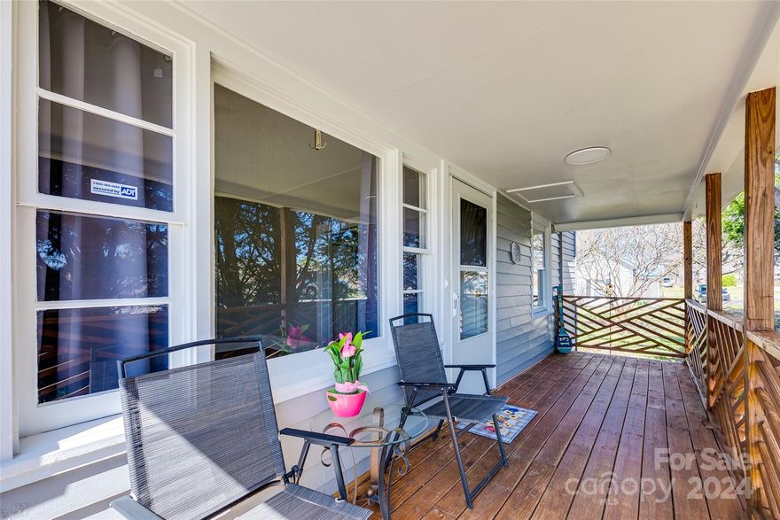 This charming 3-bedroom, 2-bathroom bungalow, located in the coveted Clover School District, offers the perfect blend of comfort and convenience. As you enter, you'll be greeted by a spacious and inviting living area, bathed in natural light from large windows that showcase the brand new laminate flooring and a cozy fireplace. The eat-in kitchen boasts all stainless steel appliances. Step outside to a large fenced-in yard with an oversized rear deck, perfect for entertaining and enjoying various outdoor activities. The detached carport with a concrete slab provides a covered parking space, and there's even a convenient storage room for your belongings. Situated just a stone's throw away from Main Street Shops and Restaurants, this property offers the ultimate in convenience. Don't miss the opportunity to make this Clover gem your own.