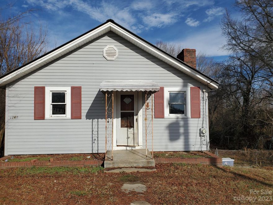 Potential! 2 bedroom, 1 bath situated on 3.33+/- acres and a pond. Walk out basement. Home needs a complete remodel. Woodstove for heat. No A/C. There is a well installed but not currently working. Well needs to be dug deeper. Fenced back yard. Seller is not able to remove/clean up any removing items and debris. Home is being sold as is, where is and with no repairs.