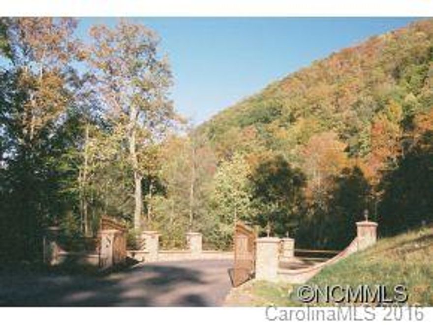 One of only a few tracts over 400 acres in WNC on market. City Water available... paved access... high elevation views... waterfall and mountain streams... Ridge-top... Part is 20+county approved lots... high end... ready to go - more lots... Concrete Bridge... wide roads. Perfect for Retreat just above Maggie Valley... clean water.  No pasture - some acreage is tillable. Majority is contiguous. Multiple unrestricted large tracts $3.5 M tax evaluation.