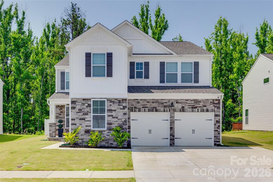 Nestled in a tranquil neighborhood, this nearly new home offers style and flexibility. The open-concept layout centers around a bright kitchen with spacious island, walk-in pantry, and stainless-steel appliances, seamlessly adjoining the inviting family room with stacked stone gas fireplace—perfect for gatherings or daily life. On the main floor, French doors open to a dedicated office ideal for remote work or study, while a private guest suite suits visitors or multigenerational living. Upstairs, the primary suite boasts a luxurious ensuite bath, complemented by three additional bedrooms, a full bath, and a versatile loft for play, relaxation, or recreation. Outdoors, a fenced backyard and deck invite quiet mornings or lively get-togethers. True move-in readiness and just minutes from shopping, dining, and major thoroughfares.