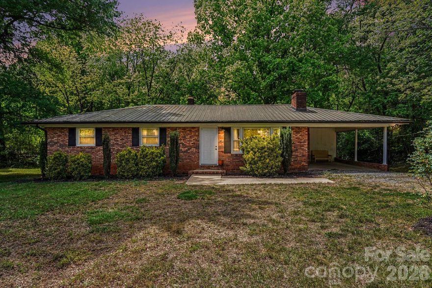 Private 0.66-acre lot, classic brick ranch, one-level living, updated interior, metal roof, and peaceful tree-lined setting

Tucked away on a peaceful, tree-lined lot, this classic brick ranch offers privacy, charm, and room to enjoy the outdoors. Situated on a spacious 0.66-acre lot, the home provides a private setting with a wide backyard and mature trees that create a natural buffer.

Inside, the home blends character with modern updates, creating a warm and inviting space to unwind or gather. The kitchen and bathrooms have been refreshed with updated finishes, and the functional floor plan offers easy, one-level living while still allowing room to personalize over time.

Additional highlights include a low-maintenance brick exterior and a metal roof.

If you enjoy quiet evenings under the trees and are looking for a solid home with character and flexibility to make it your own, this property offers a hard-to-find combination of privacy, updates, and value.