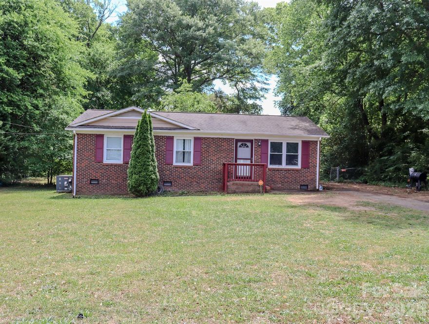 Welcome to this beautifully refreshed brick ranch in the heart of Gastonia! Situated on a generous lot, this home offers easy one-level living. 

Inside, you’ll immediately notice the brand new laminate flooring throughout the main living areas, paired with all-new lighting installed throughout the home giving the space a clean, modern feel while maintaining its classic charm. Making it perfect for both everyday living and hosting guests.

This home brings added peace of mind with a vapor barrier and insulation recently installed in the crawl space, helping improve energy efficiency and long-term durability.

Outside, enjoy a large yard with plenty of space for outdoor living, gardening, or entertaining. The classic brick exterior adds timeless curb appeal, while the established neighborhood offers a quiet setting just minutes from local shopping, dining, and everyday conveniences.

Don’t miss your opportunity to own a move-in ready home with thoughtful updates and room to make it your own!

Bonus opportunity: This home features an assumable VA loan at an incredibly low 4% interest rate (for qualified buyers)—a rare and valuable advantage in today’s market.