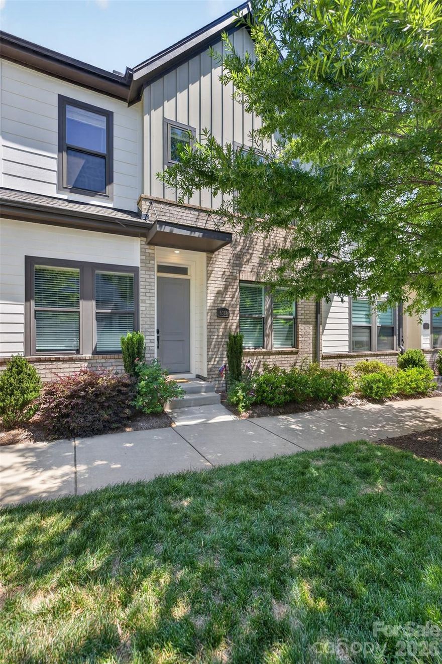 Gorgeous David Weekley townhouse in Waverly. Sought after floor plan with living areas on the main floor, bedrooms on the second floor, along with laundry + flex space w/full bath on the third floor. This house features specialty upgraded lighting throughout, waterfall cabinets in the kitchen, quartz counters, tile backsplash and gas range. Newly installed wood flooring throughout the second floor, big laundry room w/tile flooring, plus oversized primary suite featuring double sinks, seamless shower and huge walk in closet. The third floor flex space can be a large family room, a guest suite (has a full bath),  multi media space, office etc.  Convenient parking between Whole Foods and this townhouse, plus the spaces behind the building, where the oversized 2 garage is accessed. Ideally located in Waverly, arguably one of the biggest hubs in South Charlotte. Imagine walking to Starbucks for coffee, then grabbing groceries at Whole Foods on the way home. Don't feel like cooking? No problem, Foxcroft Wine, Co, Yama or The Porters House offers a bit more upscale dining to Chipotle, Chic Fil A, or Viva Chicken for grab and go meals. Later you can walk to the terrace and grab a Hagen Daaz or walk to Lifetime or Corepower Yoga  to workout. This is the perfect blend of walkable living without sacrificing the creature comforts of an upscale luxury home.