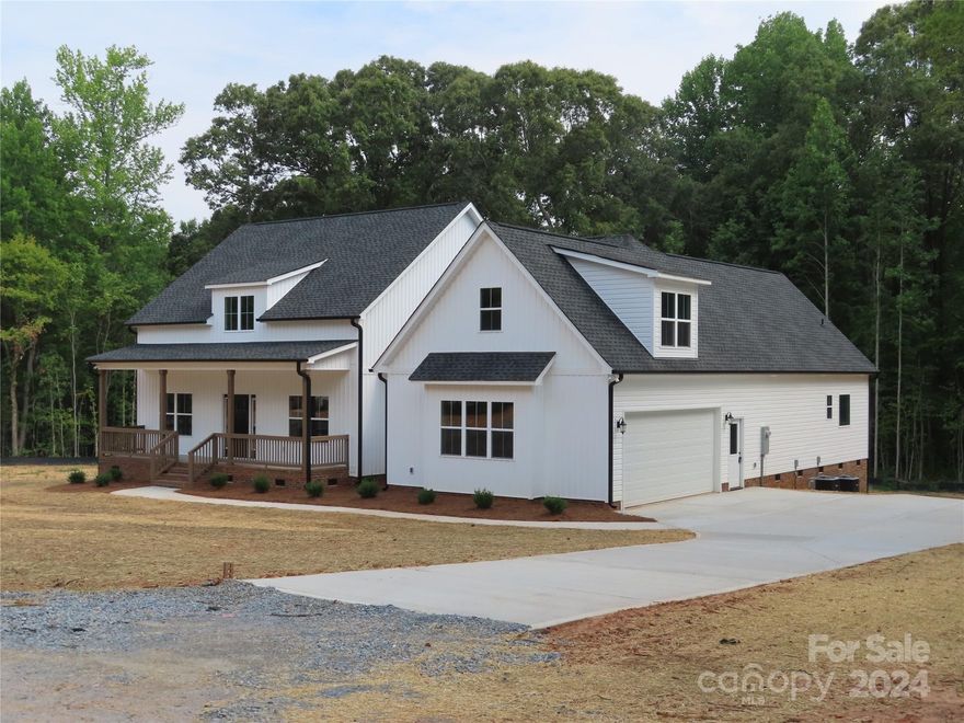 New construction sitting on 5.2 acres located about 4 miles from York. Looking for a farmhouse style home? Here it is! Nestled in privacy, there are only 2 houses on the shared driveway. As you enter the house through the foyer, the house has an open floor plan and a formal dining room. Easy to entertain your family and friends with covered porches on the front and back of the house. Any cook will love the kitchen with it's walk in pantry, kitchen island, plenty of cabinets and a sink looking over the backyard There are 3.5 bathrooms in this house to include one in the bonus room. Private laundry room ( not at the garage entry door). For GPS purposes, the private driveway is located beside 2229 Cedar Road, York SC 29745