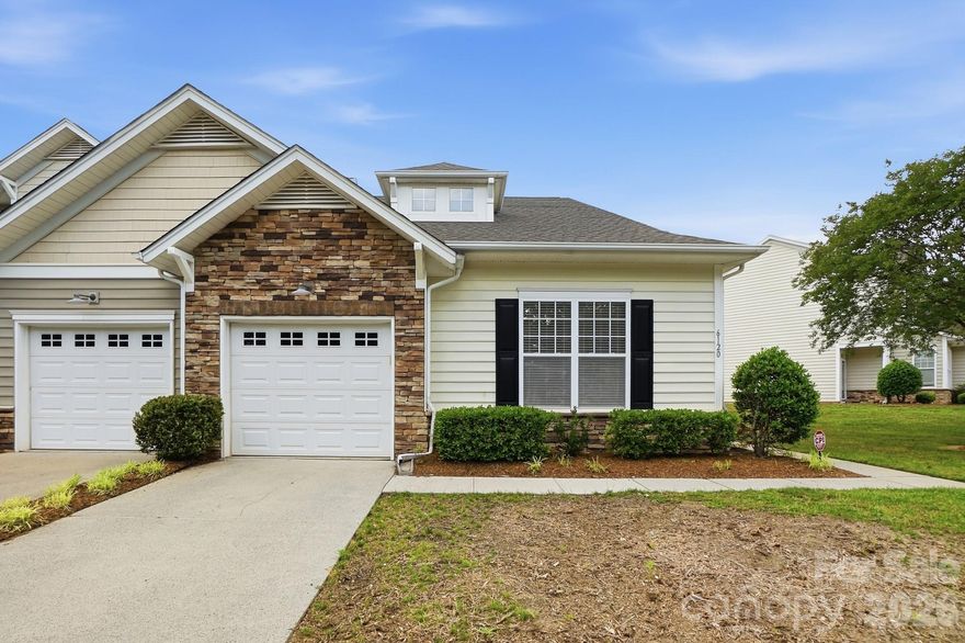 Adorable doesn't even begin to cover it-this charming, maintenance-free one level home is a must see! Featuring two bedrooms and a two full baths, the open-concept kitchen, dining, and living area creates a bright and inviting space, complete with a cozy corner fireplace. 
The spacious primary suite offers a private en-suite bath and an oversized walk-in closet. Thoughtfully designed custom built-ins provide the perfect setup for a home office or flex space.
Step outside to enjoy the open backyard-ideal for relaxing or entertaining. With the added bonus of a retractable awning for extra shade. As an end unit, you'll appreciate the added privacy and natural light. 
Comfort, convenience, and charm all in one. Don't miss this one!