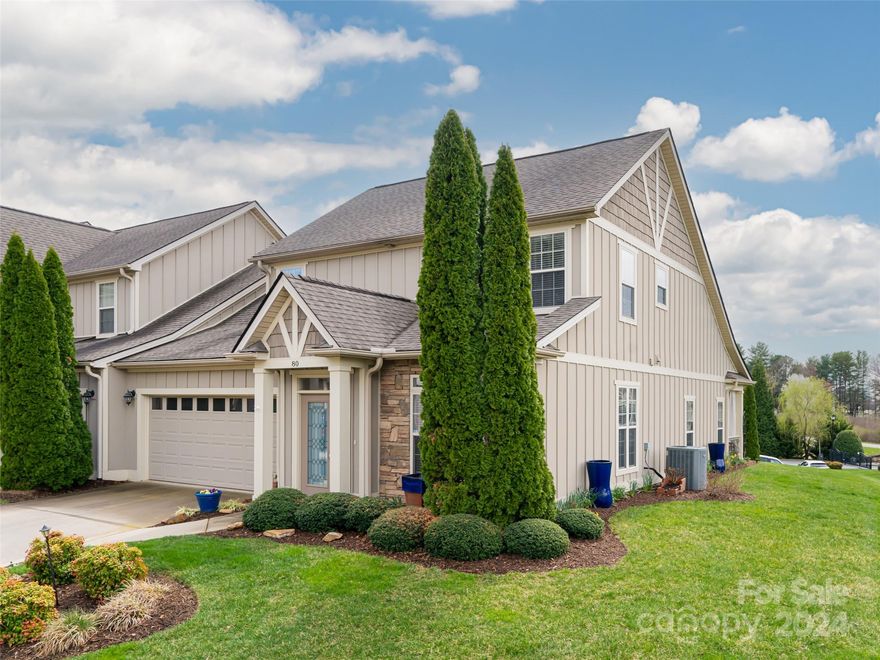 Meticulously maintained townhouse in the Village at Windstone is now available! Flowing floor
plan, vaulted great room, gas log fireplace, and an upstairs loft perfect for office, library, fitness space. Main
level primary bedroom boasts a large window and access to back patio. Ensuite primary bath has oversized marble shower and heated floors.  Whole home water filtration and spinout.  Updated secondary bathrooms.  The attached 2 car garage has an epoxy finish on the floor.  This end unit is filled with
sunlight on our cloudless days. Conveniently located, this lock and go style townhome has
quality finishes throughout. With mountain views to enjoy from the back patio, this beautiful
home will not last long! Schedule your showing today!