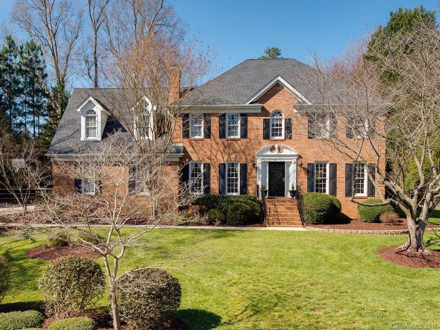 Beautiful all brick home on cul de sac lot!  Hardwoods on main w/formal LR & DR, plus den w/wood burning fireplace.  Kitchen w/granite, canned lighting, huge pantry and breakfast area over looks the large fully fenced backyard.  Dual staircases.  3 secondary bedrooms and bonus room.  Large master with master bath and walk in closet.  Big deck great for entertaining. Large storage building with electric & prewired cable. Great community amenities!