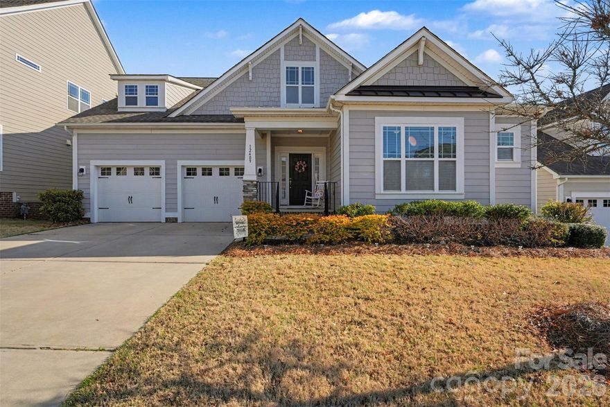 Beautifully maintained 5-bedroom home in Cornelius featuring a distinctive 1.5-story floor plan and bright, open living spaces. A welcoming high-ceiling foyer leads into an inviting open layout highlighted by beautiful hardwood floors. The stunning great room features a dramatic two-story vaulted ceiling and a cozy fireplace, creating a warm and spacious gathering area. The great room flows seamlessly into the modern kitchen, which offers a large center island, granite countertops, stainless steel appliances, ample cabinetry, and a pantry—perfect for entertaining and everyday living. The main-level primary suite provides a private retreat with dual vanities, a walk-in shower, and generous closet space. Two additional bedrooms and a full bath are also conveniently located on the main floor.
Upstairs, you’ll find two more bedrooms, a full bath, and a versatile loft with 2 skylight windows, offering flexible space for a home office, media room, or play area.
Step outside to enjoy the elevated covered deck with open views of the community farm and recreational green space beyond, providing a peaceful setting for relaxing or entertaining.
Located in a desirable neighborhood with direct access to the Plum Creek Greenway, the home is also conveniently close to William Amos Hough High School and Bailey Middle School. This home offers a wonderful combination of space, natural light, and convenience in a sought-after Cornelius location. Showings start Friday 4/3.