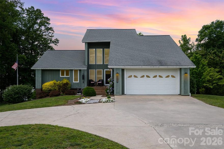 Spring and summer days on the lake are waiting for YOU! This special waterfront home has been beautifully renovated & checks all of the boxes! Enter into a light filled two story great room with beautiful hardwoods & French doors with direct access to a maintenance free, sprawling Duxx deck. The semi-open floor plan features a custom Walker Woodworking kitchen with soft close drawers, glass front cabinets, convenient "appliance garage" to keep your kitchen gear out of sight, and honed granite countertops. There is a lake view from every room! Primary bedroom on main with new bathroom & walk in closet. Don't miss the clever laundry chute which makes your chores a breeze. Second bedroom on main with full hall bath. Upstairs, find a loft/office with stunning lake view! Septic for 2 bedrooms BUT there's an additional bonus/bedroom and bath on the upper level. Huge walkout basement with fire place, 1/2 bath, & bonus room. Beautiful landscaping with deep water dock. New hot water heater installed Feb. 2026. City of Kings Mountain charges an annual lake lease for the Moss Lake waterfront.