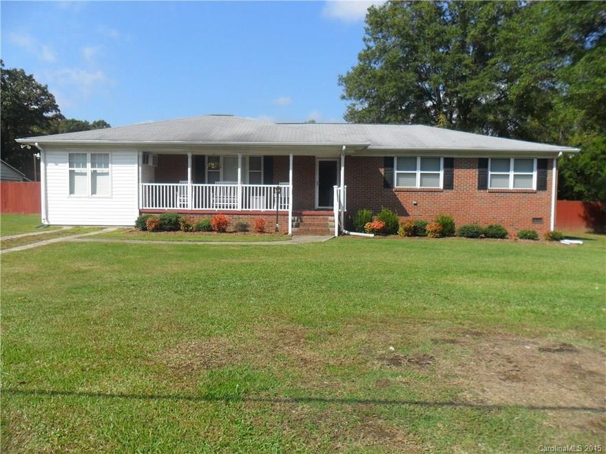 What a doll house!  Updated full brick home sitting on a full acre.  Fenced yard with 2 car garage and storage building.  Pride of ownership definitely shows.  Close to schools and major highways.  Large screened in  porch with extra deck.  Extra living space can be used as a den, playroom, or 4th bedroom.  This is the home you have been looking for!