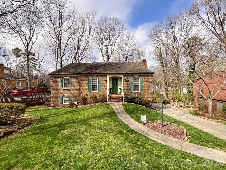 Close to I-485, shopping, and entertainment - this charming split level home boasts two separate living spaces.   The main floor has 2 bedrooms (one primary) with a full bath, eat-in kitchen, living room and a dining room that opens up into a beautiful sun room and second story deck.  The lower floor offers a large family room with two other bedrooms and a bath.  Double doors lead out to the two car garage and a quaint back yard. Sought after Union County schools and a low HOA fee that covers a plethora of amenities - pool, walking trails, pickleball court, sidewalks, and play ground, this is the one you've been looking for.