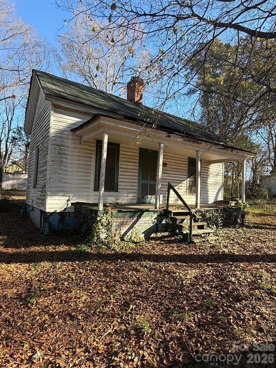 Investor Special with Massive Upside! Located in a growing area of Shelby, this value-add property offers an excellent opportunity for fix-and-flip investors, buy-and-hold landlords, or builders looking to expand their portfolio. The home already features solid structural framing and a serviceable roof, providing a strong starting point for renovation. With the potential to add square feet and reposition the property into a highly desirable product, investors can significantly increase resale value and equity. Surrounded by improving homes and strong comparable sales, this project is ideal for those seeking their next profitable venture. Property is being sold as-is — bring your vision and unlock the potential.