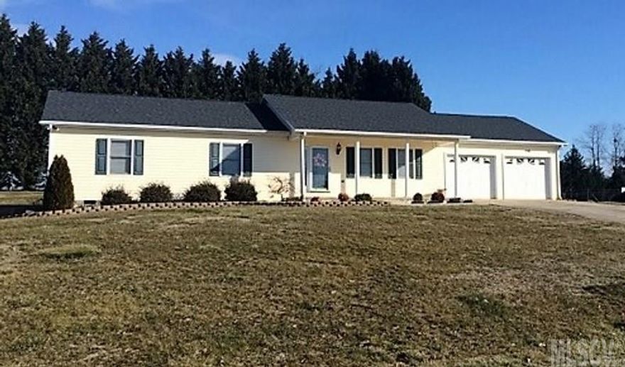 This ranch has 3 bedrooms, 2 baths, an open kitchen/dining room, large great room (hardwood floors added in this room & the hall in 2015), above-ground pool, double garage & a stick built outbuilding. Neutral colors & carpet. Security system. Roof in 2011, heat & air in 2004.