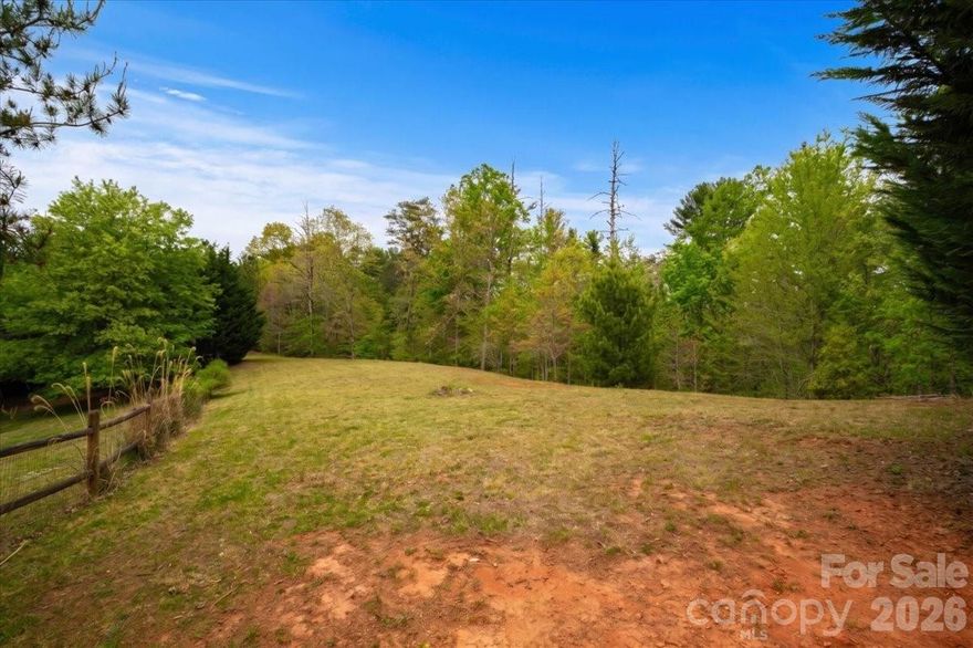 Welcome to Lot 6 of Reaston Ridge, where convenience meets mountain serenity. This property is ideally located with easy access to I-26; being just 20 minutes from Asheville, 10 minutes from Weaverville and Mars Hill, and 30 minutes to AVL Airport and Burnsville. This mostly level homesite offers the perfect foundation for your next chapter. Whether you're envisioning a full-time residence or a mountain retreat, the gentle topography makes for an easy build and low-maintenance yard. 

Nature lovers will appreciate the wooded portion that enhances the property’s peaceful setting, while still offering stunning year-round mountain views. With low HOA fees and thoughtful, reasonable restrictions, Reaston Ridge strikes the perfect balance between freedom and community. 

Enjoy the best of WNC right outside your door, with nearby opportunities for hiking, mountain biking, ziplining, and disc golf. Off-frame modular homes are permitted with approval, giving you added flexibility to bring your vision to life. If you're looking for a quiet neighborhood with easy access to town and endless outdoor adventure, Lot 6 is ready to welcome you home.