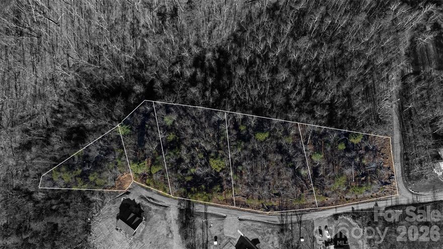 Located in an established gated community near South Mountain State Park, this unique offering includes five buildable lots at the top of the mountain. Established roads provide access all the way to the property, with only a few gravel sections. Enjoy breathtaking mountain views, exceptional privacy, and a peaceful natural setting. Build one custom home or develop all five lots—the possibilities are yours. Buyer to verify all information with the city and HOA regulations.