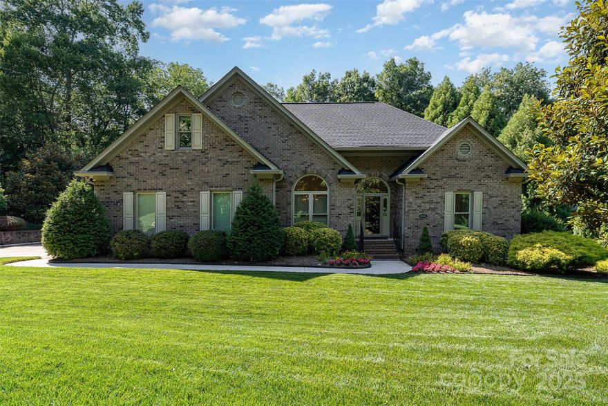 This meticulously maintained full-brick home is a true gem, boasting abundant natural light and lush landscaping that offers privacy on a .46-acre lot. The open floor plan features cathedral ceilings in the entryway and living room, a bright kitchen with granite countertops, stainless steel appliances, custom pantry drawers, and a cozy breakfast area. The main level includes a primary bedroom with an en suite bath, dual sinks, and a walk-in closet, plus a convenient laundry room. An addition of a 4-season sunroom leads to a private patio deck. The second level houses three additional bedrooms and a full bath. This home also includes a fully encapsulated crawl space with a dehumidifier, house water filter, tankless water heater, an 8-zone irrigation system, 2 HVAC units with multiple zones on the main level, and a new roof installed in 2023. You must see this home to appreciate its many extras!