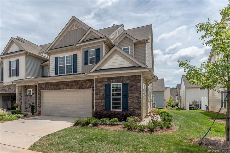 This Gorgeous end unit is for your clients who want everything. It is Better that NEW.  Over $25K in upgrades completed after closing. Custom draperies and hardware, brand new enlarged patio for entertaining, custom closets in Master by Elfa w/specialty lighting in every room.  Shows like a model with hardwoods, stainelss appliances, upgraded granite in kitchen and baths, 2 car garage and open floorplan.