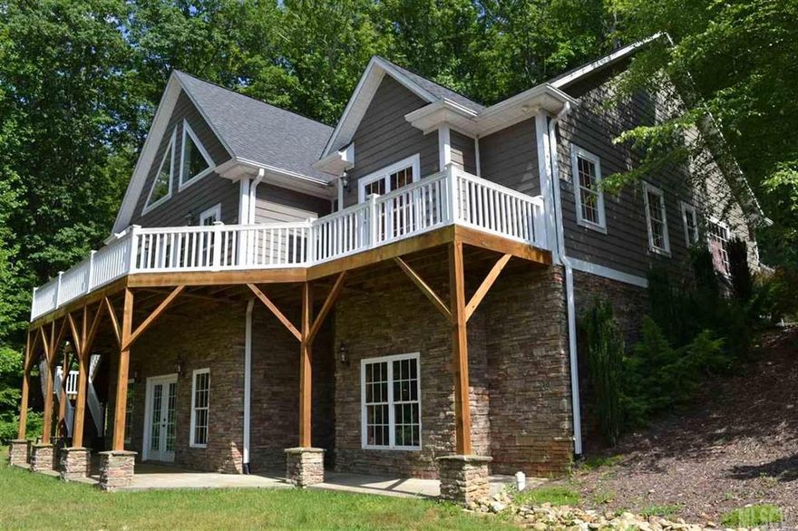 Enjoy this private and secluded mtn home with close access to I 40! This home has all the amenities you desire! Kitchen has lots of custom cabinets with stainless steel appliances and granite tops. The open floor plan has a rock accent wall in the dining area and a rock fireplace with gas logs to enjoy on both sides of the room. The living space has a vaulted ceiling with large windows to enjoy the mountain setting and views. The MBR has a tray ceiling, a sitting area and a personal access to the front porch. The MB has dual sinks, separate shower, jetted tub, and a heated tile floor for your comfort. The 2 other bedrooms share a large Jack-n-Jill bathroom and there is a great bonus room over the garage.  The full basement has a rough-in bathroom, studded walls and wiring in place for potential rooms to finish later. Central vac, tankless waterheater, dual fuel H&A system, half bath, deck and patio for grilling and relaxing and much more are added extras to go with this beautiful home!