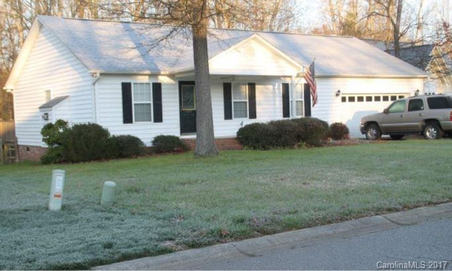 Well maintained home with many upgrades. Hardwood floors in main living area. Split bedroom plan. Breakfast area & dining room. Master bath has garden tub. Bar area in kitchen. Open floor plan. Oversized deck with landscaped yard. 2 car garage with extra storage area.