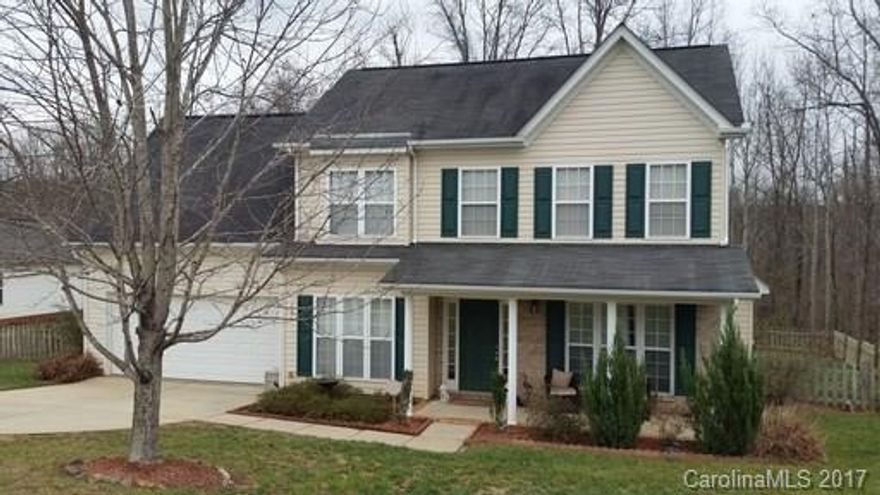 4 bedroom home in Oxford Hunt community near East Lincoln High School. New laminate flooring in the living room and dining room. Granite counter tops, subway tile backsplash and gas stove in the kitchen. Breakfast bar in the eat in breakfast area with bay window. Large 4th bedroom or it could be used as a bonus room. Dual vanity in the master bath with separate tub and shower. Oversized two car garage. Private deck and fenced in yard.