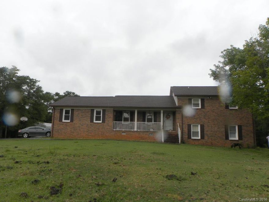 Price to Sell!! Tri-level 4 BR/3 full BA family home! Great home located on 7 acres with a workshop. New well pump and roof 2014. Spacious 2 car garage attached to home, nice backyard patio. Interior features include a beautiful stone fireplace located in family room, breakfast bar, and much more. Bring your live stock. Motivated seller!!