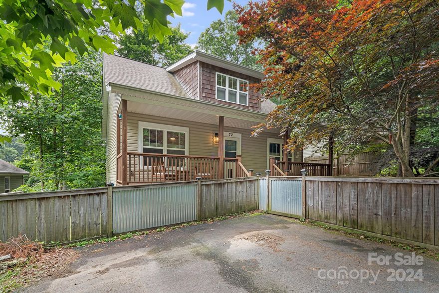 All the Convenience!!  Prime Location 2 miles from Biltmore Village/Biltmore Estate, 3 miles to downtown Asheville,  with easy access to Hendersonville Rd., I-40 and more!  Get anywhere in Asheville in just minutes.  Built in 2010, this adorable bungalow is fully fenced and upgraded to meet all your expectations.  New HVAC as of 2023, Kitchen Appliances 2022, two electric fireplaces, built-in shelving and updated bathrooms make this home move-in ready!  This fantastic floor plan includes a massive primary suite with ample storage, making this home a must-see.  Whether you're looking to relax on the shady front porch with the pups or enjoy the sunshine gardening in the backyard, this home has what you're looking for this summer.