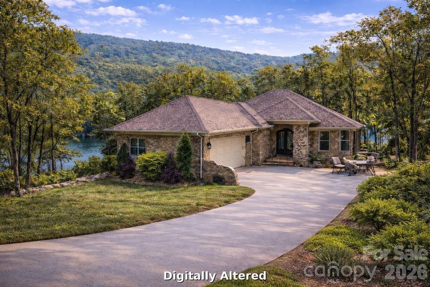 Priced Below Appraised Value.Welcome to luxury waterfront living at its finest—nestled on a private peninsula within an exclusive gated community, this stunning ranch-style home offers breathtaking lake views from most areas of the home. In addition, this home offers breathtaking mountain views.

Designed with elegance and comfort in mind, the home features soaring 10-foot ceilings throughout most of the interior, 8 Foot Doors, enhanced by heavy crown molding, and rich bamboo flooring, tile and plush carpet. Natural light pours into the spacious layout, creating a warm yet refined atmosphere.

The gourmet kitchen is a true centerpiece—complete with granite countertops, a large island with a gas cooktop, 42-inch soft-close cabinetry and a walk-in pantry—perfect for both everyday living and entertaining. Adjacent, a separate dining room provides the ideal setting for formal gatherings.

Relax and unwind in the expansive sunroom or step out onto the screened-in porch or patio where serene lake and mountain views create a peaceful retreat. 

The spacious primary suite offers a luxurious escape with dual closets and a spa-inspired en-suite with wet room and dual vanities. Two Secondary bedrooms are generously sized, with sharing a large adjoining bath, thoughtfully positioned for convenience. A dedicated office with French Pocket doors.

Additional highlights include a stylish half bath with elegant chandelier lighting, a well-appointed laundry room, and a wood-burning and gas fireplace with a blower for cozy evenings.

This exceptional home blends luxury, functionality, and unmatched waterfront views—offering a lifestyle of comfort, privacy, and sophistication.

Design and build your custom pier- already approved and ready to be tailored to your vision. 


Residents of The Springs enjoy premier lake access to High Rock Lake, along with a wealth of private community amenities including a clubhouse, outdoor pool, hot tub, tennis and pickleball courts, scenic walking trails, boat launch, community piers, boat and RV storage, picnic areas, and a peaceful pond.

Discover more about this exceptional community at www.thespringsathighrock.org