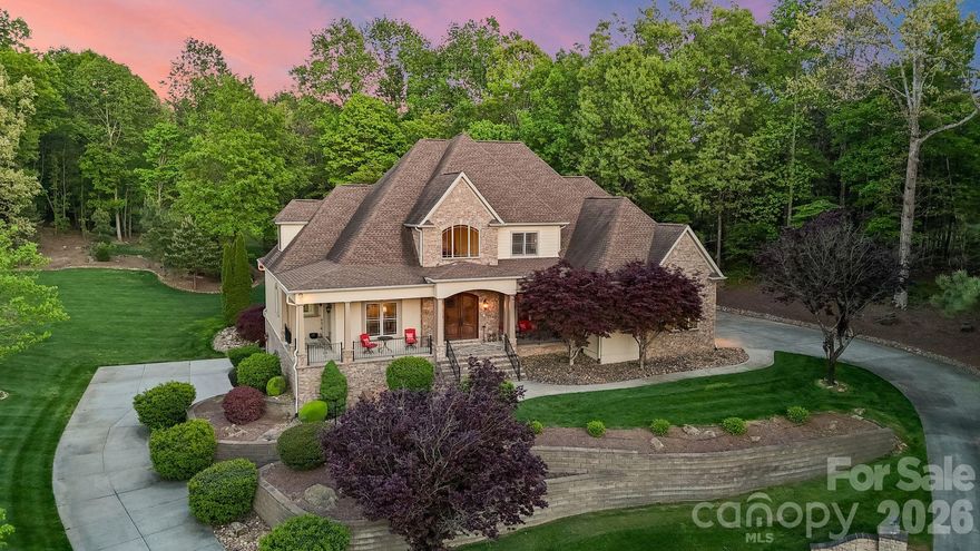 Custom-built and impeccably maintained, this exceptional home is tucked away on a peaceful cul-de-sac in Denver’s sought-after Windsong community. Set on a gorgeous, park-like lot and steps from Lake Norman, the property offers a rare blend of tranquility, thoughtful design, and everyday functionality. Every detail of this home reflects meticulous care and pride of ownership. Designed for both comfort and entertaining, the spacious layout easily accommodates working from home, crafting, hosting out-of-town guests, or pursuing hobbies in the workshop-style garage. A dedicated home gym, abundant storage on every level, and flexible living spaces ensure the home adapts beautifully to changing needs. Outdoor living is equally impressive, with four covered porches — two screened-in — plus an additional deck and outdoor gas grill, creating multiple spaces to relax and enjoy evening sunsets. The expansive yard invites summer play, garden parties, a friendly game of croquet, or even the future addition of a pool. Ideally located in a quiet lake community, yet conveniently central to Charlotte and the Lake Norman towns, this home offers the lifestyle you’ve been waiting for — peaceful, polished, and perfectly cared for. See photos for a potential pool rendering. Imagine enjoying your peaceful, parklike backyard, poolside! Information regarding potential pool build is available.