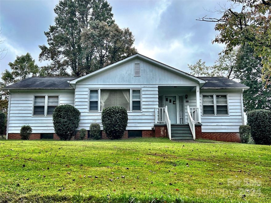 This well built home on .73 acres is just inside the city of Morganton.  Conveniently located just off of Hwy 18 near I-40, it is close to dining and shopping. With a little TLC, this 3 bedroom, 1 bath home could be brought back to life! The main level features hardwoods and tile throughout.  The basement features two finished rooms that are heated and cooled but cannot be counted as heated living area. Access to the basement can be made through the interior of the home in the kitchen or from the outside through the electric garage door with remote openers. Selling as is.