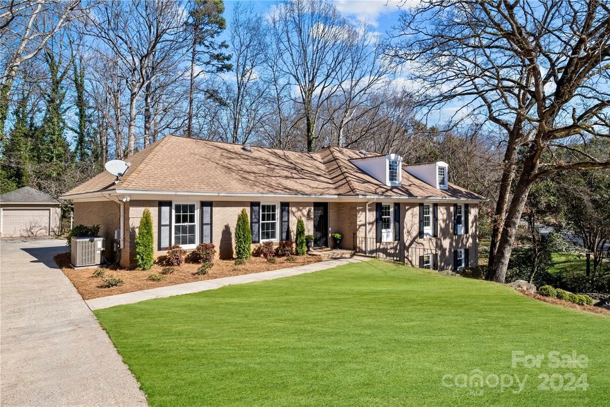 Welcome to Robinson Woods, where sophistication meets comfort in this beautiful 5-bedroom, 3-bathroom ranch-style home boasting a daylight basement. With a fantastic floorplan, this residence features 4 spacious bedrooms on the main level and an additional bedroom on the lower level, complemented by a vast lower level family room. Step into the heart of the home, where a renovated kitchen awaits with pristine white cabinets, gleaming stainless steel appliances, elegant quartz countertops, and a tasteful tile backsplash. The centerpiece of the kitchen is the center island, offering ample seating and a focal point for gatherings and culinary delights. Retreat to the large primary bedroom, which showcases an updated primary bath adorned with granite countertops, rich wood cabinetry, and an oversized shower featuring dual shower heads. Experience the perfect blend of style and functionality in this meticulously crafted home, where modern amenities harmonize with timeless charm.