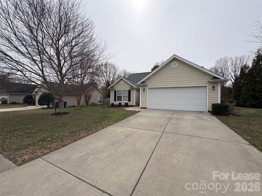 Charming ranch home in desirable Cranston Crossing featuring large living room with vaulted ceilings, a gas fireplace open to the eat in kitchen with oak cabinets and stainless steel appliances access to the fence back yard for private evenings at home. The Primary suite offers tray ceiling, walk-in closet, and en-suite bath with soaking tub and separate shower. Two additional bedrooms with common hall bathroom. Situated on a level lot and  conveniently located near I-485, the Monroe Bypass, shopping, dining, and sought-after Union County schools. Dogs under 20lbs allowed, no cats.