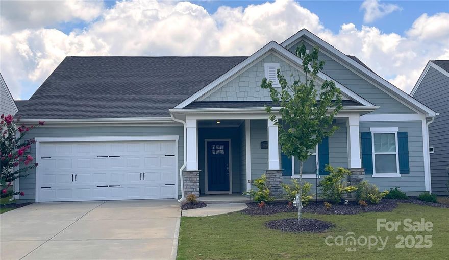 Now available in delightful Ansley Park, a David Weekley community, is a lovely ranch home with a spacious, open floor plan and 4 large bedrooms. The beautiful gourmet kitchen has a large island with a stainless farmhouse sink, soft gray cabinets and pristine granite countertops. All appliances are stainless. The kitchen is open to the dining area and family room, which are awash with natural light from several oversized windows. This home boasts a split plan with 3 large bedrooms on one side and the owner's suite on the other. The full hall bath has 2 sinks and private access from one of the 3 additional bedrooms. To top it off, the owner's bath features a super-sized, tile shower with built-in seat and has a spacious double vanity. The entire backyard is nicely level and fully fenced with an oversized concrete patio.