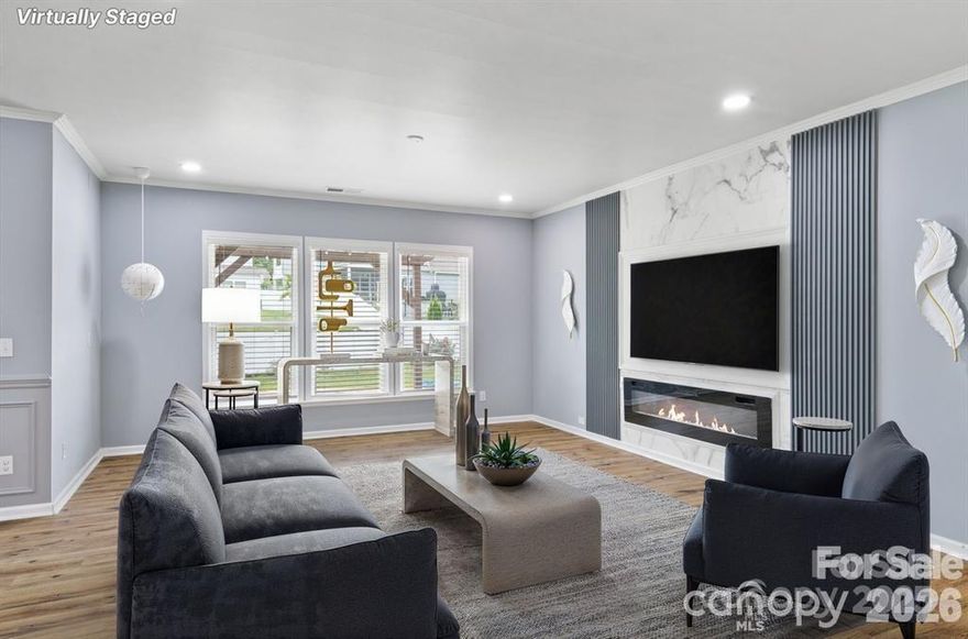 Executive 5 Bedroom, 4.5 bathrooms Home in McCullough Is a Showstopper! Upgraded Features Include Heavy Moldings, Beautiful Water-Resistant Laminate Wood Floors, Designer Lighting & An Amazing Oversized Back Patio! Chef's Kitchen with White Cabinetry, SS Appliances, Wall Oven, Quartz Countertops, Tile Backsplash, Large Breakfast Island & Butler's Pantry. Open Floor Plan. Office/Flex Space & Tons of Storage. Guest Suite On 1st Floor with Full Bath & Private Entrance. Upstairs Is a Spacious Owner Suite with Walk in Closet, Dual Vanities, Spa Shower & Tile Floors. 3 Additional Bedrooms Up All with Walk in Closets, 2 With Attached Jack & Jill Bath. A Large Bonus Area, Hall Bath & Laundry with Sink & Cabinets Round Out the Second Floor. Relax On the Gorgeous Paver Patio with Pergola. 2 Car Garage with Epoxy Floor. Fenced Back Yard. Irrigation Front & Back. Rich Amenities Include 2 Pools, Tennis, Club House, Dog Park, Pond & More. Award Winning Fort Mill Schools. Low SC Taxes. Mins to I-77 & I-485.Fresh paint and cleaned is ready for move in and relax.