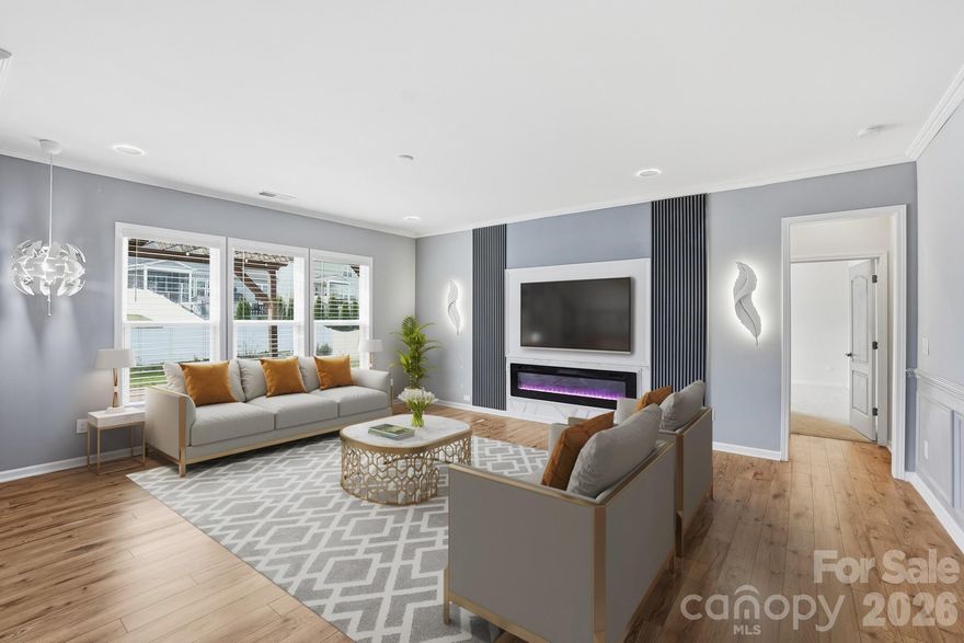 Executive 5 Bedroom, 4.5 bathrooms Home in McCullough Is a Showstopper! Upgraded Features Include Heavy Moldings, Beautiful Water-Resistant Laminate Wood Floors, Designer Lighting & An Amazing Oversized Back Patio! Chef's Kitchen with White Cabinetry, SS Appliances, Wall Oven, Quartz Countertops, Tile Backsplash, Large Breakfast Island & Butler's Pantry. Open Floor Plan. Office/Flex Space & Tons of Storage. Guest Suite On 1st Floor with Full Bath & Private Entrance. Upstairs Is a Spacious Owner Suite with Walk in Closet, Dual Vanities, Spa Shower & Tile Floors. 3 Additional Bedrooms Up All with Walk in Closets, 2 With Attached Jack & Jill Bath. A Large Bonus Area, Hall Bath & Laundry with Sink & Cabinets Round Out the Second Floor. Relax On the Gorgeous Paver Patio with Pergola. 2 Car Garage with Epoxy Floor. Fenced Back Yard. Irrigation Front & Back. Rich Amenities Include 2 Pools, Tennis, Club House, Dog Park, Pond & More. Award Winning Fort Mill Schools. Low SC Taxes. Mins to I-77 & I-485.Fresh paint and cleaned is ready for move in and relax.