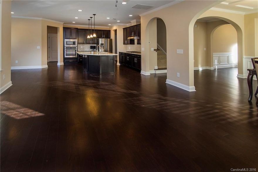 3640 sq ft of well planned open expansive space awaits you in one of Byers Creek's finest homes.  Have your morning coffee on either of the covered porches, prior to getting ready for work in the luxurious master bath.  Master bedroom is HUGE!  Kitchen and overall design will please the modern designers eye.  The kitchen island just begs for family get togethers.  Home office and entire home have high ceilings and upgrades throughout.  Walking distance to shopping and privacy across the street.