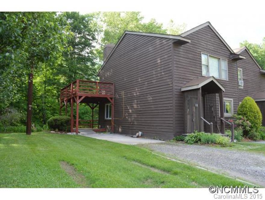 Great Location in Maggie Valley overlooking Jonathan Creek! This 2 Bedroom, 2.5 bath Townhome would make a great 2nd home or investment property. Sit by the fire in your cozy living room or relax out on the 1 of 2 large decks or slide over the bank and trout fish!