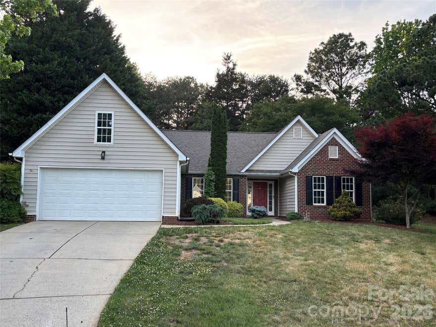 Wonderful ranch home with partial brick exterior, offering the perfect blend of comfort and convenience. Home features vaulted great room open to kitchen, dining room & breakfast area w/engineered hardwoods in most areas creating a warm and inviting atmosphere in every room. The oversized master suite has a recent (2023) master bath update with large shower, new ceramic/vanities/fixtures & quartz countertops.  Entire interior painted in 2026 with A/C & gas furnace new in 2022.  Situated on a large .67 acre cul-de-sac lot with loads of rear yard privacy, perfect for entertaining and outdoor living. Located in a well-known, family-oriented community with walkable access to a community pool, local restaurants and shopping.  This home is a wonderful opportunity for anyone looking for a single-story home in a desirable location.