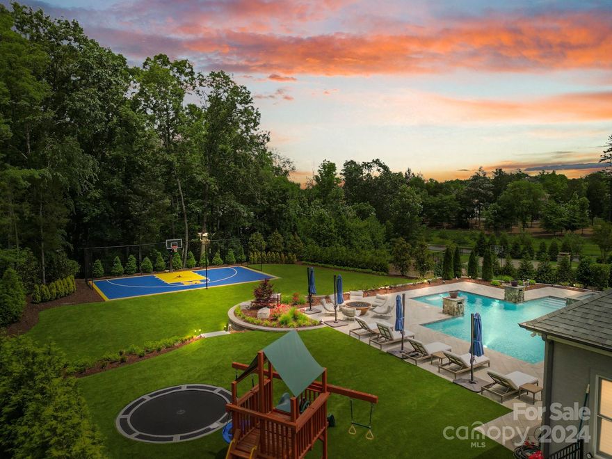 Nestled within the highly sought-after Reserve at River Run Community, this luxurious residence epitomizes modern elegance and sophistication. Perfectly placed on a one-acre lot, the house is equipped with modern appliances, a contemporary design, and expansive windows that perfectly capture the lusciously landscaped yard. As you enter inside, you are greeted by an expansive open floor plan that seamlessly merges the living, dining, and kitchen, creating an inviting space for entertaining and relaxation. The exterior space is equally impressive and designed to maximize your enjoyment of outdoor living. The meticulously landscaped grounds provide privacy and tranquility while creating an idyllic setting for outdoor gatherings and entertainment. The highly sought-after location makes travel a breeze to restaurants, shops, and entertainment that Davidson has to offer.