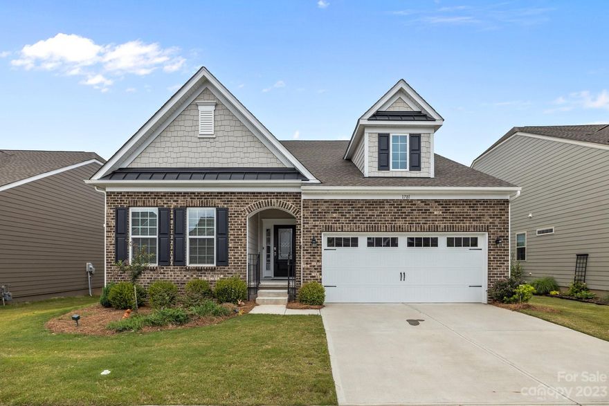 Welcome to Tree Tops and this "like new" move-in ready home just waiting for your personal touch! Home was only lived in for 6 months - oven has never been used. Wonderful private lot that backs up to trees and woods. Enjoy time on the great covered back porch overlooking nature. Easy to maintain wood floors and tile cover the entire home. Split bedroom floor plan gives everyone their privacy.  Huge quartz island is great for your guests to gather round when entertaining. The Dover plan offers a large primary bedroom with a sitting room that has access to that nice back covered porch. Tree Tops has so many wonderful amenities to enjoy and lawn care is included in the monthly HOA fee. All this with low Lancaster Taxes plus Tree Tops is convenient to shopping, dining, medical care and the Ballantyne Area. Come see this wonderful home today!