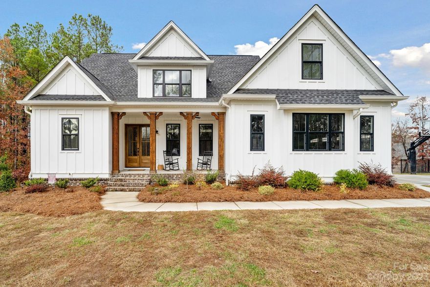 Back on the market at no fault of the seller!! This one has everything an entertainer or homeowner could want. Primary on the main. Upstairs bedrooms. Finished basement complete with full bathroom, theatre room, walk out access to the hot tub, saltwater swimming pool or lake. Hang out on the deck off the main floor or chill at the pool and enjoy the sheer descent waterfall. Have everyone over for s'mores and an outdoor movie or screen a film in the awesome home theatre. The basement is as versatile as a space gets. Home office, man/woman cave, home gym, secondary living quarters or anything else you could come up with. Lake views from several areas of the home including living room, kitchen area, decks and backyard. The backyard is fenced with an opening and walking path right down to the lake to launch your canoe. This house is in a great location. York address, Clover Schools and 10-15 minutes from Rock Hill, Fort Mill, Lake Wylie and Steele Creek.