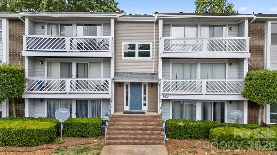 Spacious 2BR / 2BA first-floor condo with wood-laminate floors and an updated kitchen featuring a large breakfast bar—ideal for entertaining. Open great room offers abundant space for living and media or a home office setup. Sliding glass doors open to a covered porch for quick outdoor access. Primary suite includes a walk-in closet and private bath. Convenient ground-floor location, easy upkeep, and close to shopping, dining, and entertainment. Great value—move-in ready.