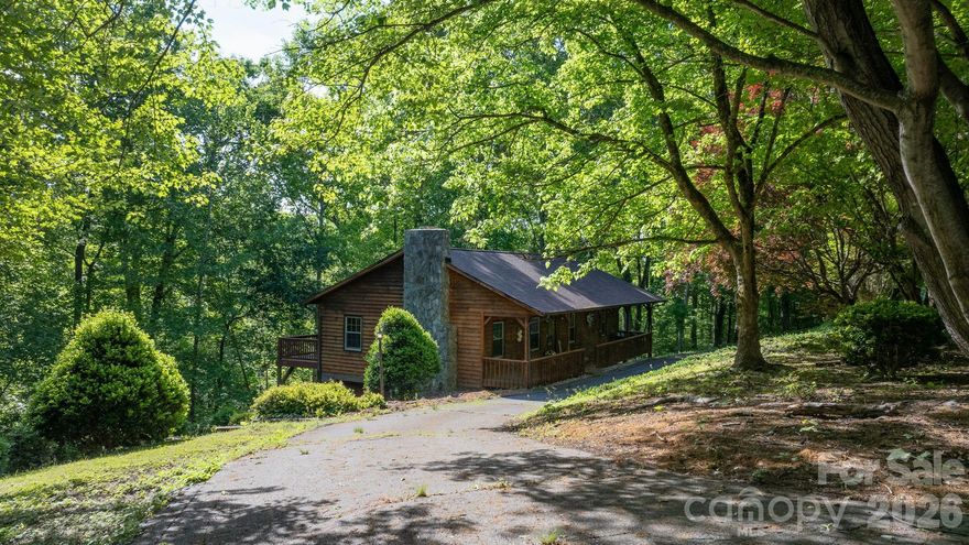 Tucked away on a private cul-de-sac street in the highly sought-after Mountain View area, this beautifully updated ranch-style home offers the perfect blend of peaceful wooded seclusion and convenient access to Hwy 321 and I-40. Set on a private .99-acre wooded lot — no grass to mow, just nature at your doorstep — the home welcomes you with a large covered front porch and delivers a private rear deck ideal for entertaining or quiet evenings under the trees.
Inside, 2,353 square feet of finished living space spans the main level and a full basement, offering 3 bedrooms, 2.5 baths, and a flexible bonus room downstairs that can easily serve as a 4th bedroom. You'll find zero carpet throughout — refinished hardwoods, laminate, luxury vinyl plank, and tile flow seamlessly from room to room.
The updated kitchen shines with crisp white cabinetry, granite countertops, soft-close drawers, a pantry, and stainless appliances. A cozy gas fireplace anchors the main living area, perfect for cool mountain evenings. The basement also houses a single-car garage, adding convenience and covered storage.
This home has been thoroughly refreshed top to bottom: new roof, new heat pump, new PEX plumbing, new well pump and motor, replacement windows, fresh paint throughout, new deck, new blinds, and updated bathrooms. Move-in ready with peace of mind built in — and the added bonus of no city taxes.