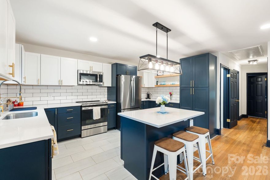 Well-maintained 4 BD / 2 BA in Ardmore offering functional living space across two levels. The main floor includes a living room, dining area, kitchen, three bedrooms, and a full bathroom. The kitchen features updated finishes including GE stainless steel appliance suite, subway tile backsplash, floating shelves, and modern navy cabinets. The basement level adds additional living space with a laundry room with enough room for recreational use, another living area that can be set up as an in-law or guest suite that is connected to the fourth bedroom with its own private en-suite full bathroom with 2025 updated glass shower door. Other recent improvements include 2024 HVAC system and electrical panel. The basement level has its own separate entry with a screened porch overlooking the backyard and a recently added partial wood fence creates privacy. Property is currently occupied. Please do not disturb residents. Showings by appointment only with pre-approval. Owners are NC licensed real estate agents.