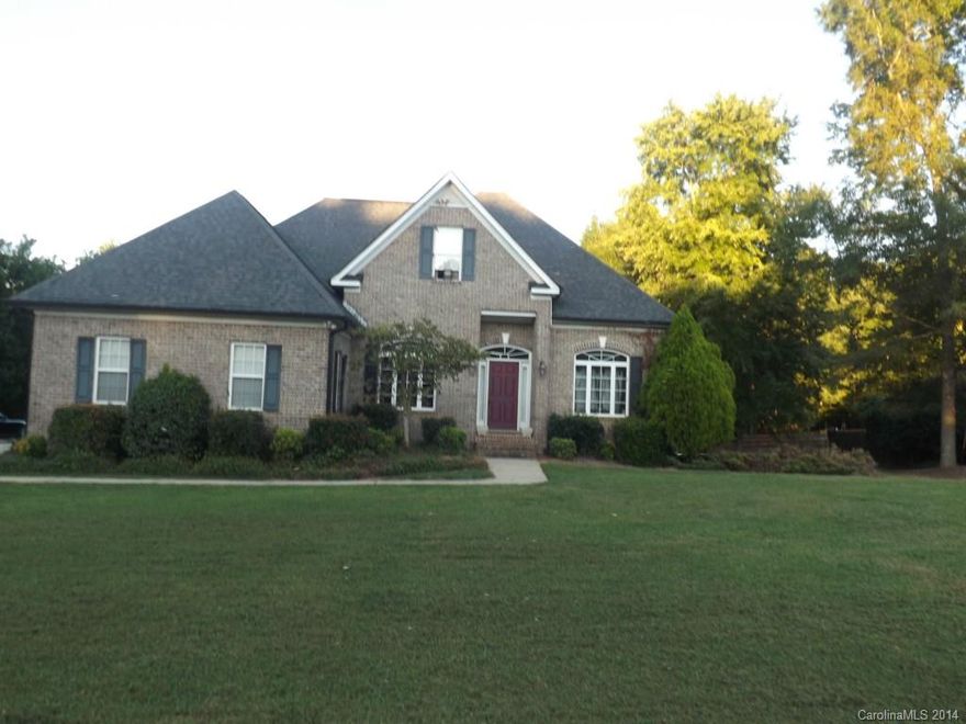 Own your own private retreat!! This brick home features a beautiful outdoor entertaing space. In ground pool, hot tub, large wood burning fireplace and a 20' x 36' pool house with bath. Enjoy an afternoon stroll down to the pier that is on Lake Twitty. Fenced back yard with black metal fencing. Home features a very open plan. Large kitchen that is open to the breakfast area and den. Great room , dinig room amd downstairs bedrooms have wood floors. Upstairs has great room with surround sound.