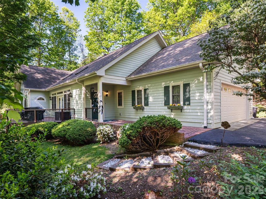 This beautiful, well-maintained home is the perfect place to make memories of a lifetime. The main level includes a spacious primary suite plus two bedrooms and a guest bath. The living room and kitchen are illuminated by skylights, creating a bright and open atmosphere. The vented gas fireplace in the living room is the perfect place to gather on chilly nights. Step out to the four season porch on the main level for a cup of coffee or a relaxing evening or enjoy the large open deck. Corner lot with extreme privacy!